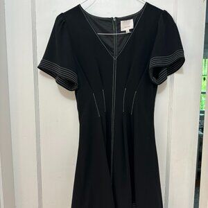 Black dress with white stitching